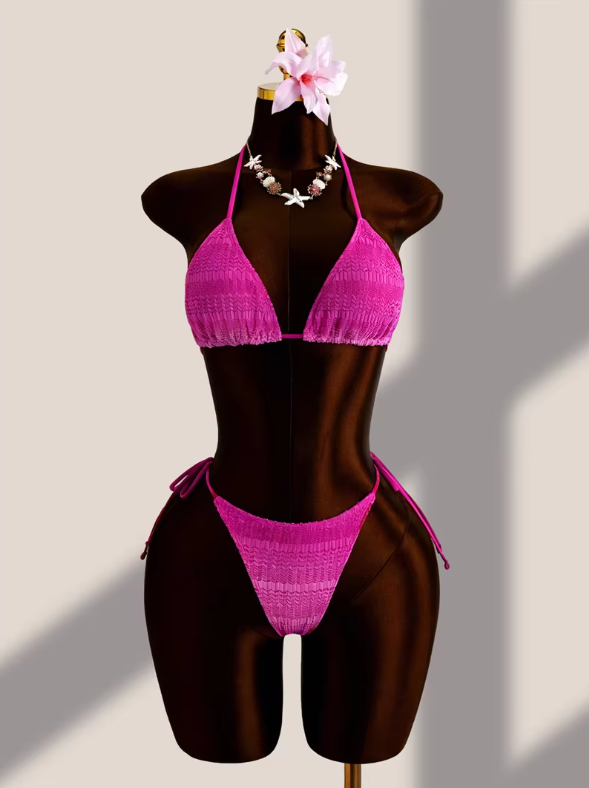 Front view of the Orchid Estelle bikini with textured pink triangle halter top and matching tie-side bottoms.