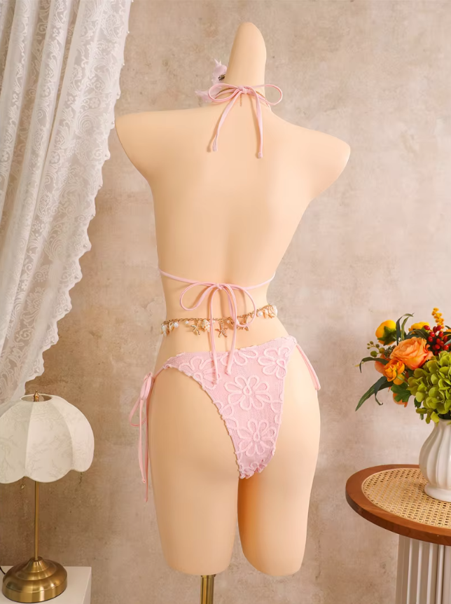 Back view of pink floral embroidered bikini set with adjustable halter tie, back tie and cheeky high-leg bottoms.