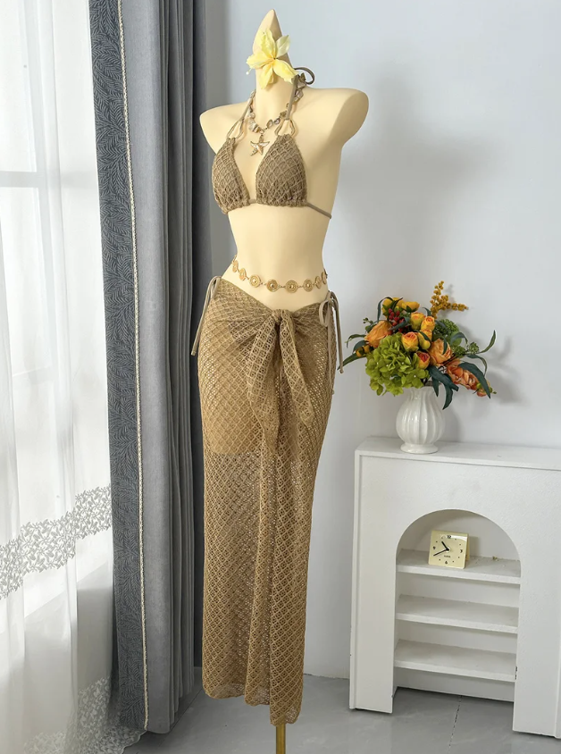 Angled front view of dune textured halter bikini set with sheer openwork maxi sarong.