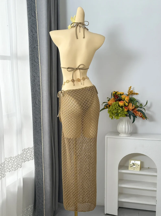 Back view of dune openwork bikini and maxi sarong set with halter tie and back tie fastening.