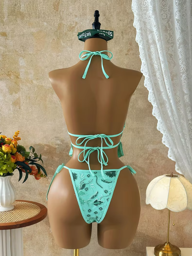 Back view of the CURATOR Collection Bijou Set in jade, showing the halter neck tie, double back tie closures and matching tie-side bikini bottoms.