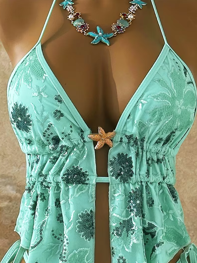 Close-up of the CURATOR Collection Bijou Set in jade, highlighting the plunging halter neckline, gathered peplum top and starfish centre detail.