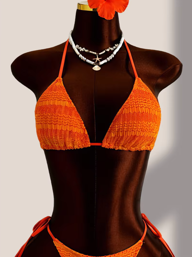 Front view of the Saffron Estelle bikini with textured orange gradient triangle top and matching tie-side bottoms.