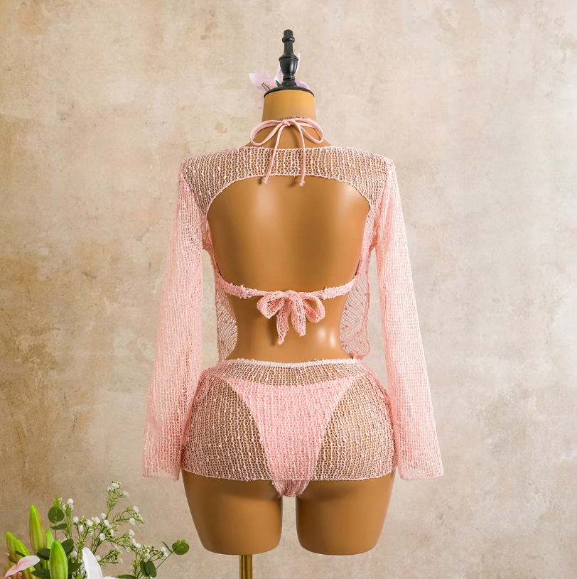 Back view of the camellia Milano Set cover-up showing open back detail, tie closure and sheer open-knit finish.