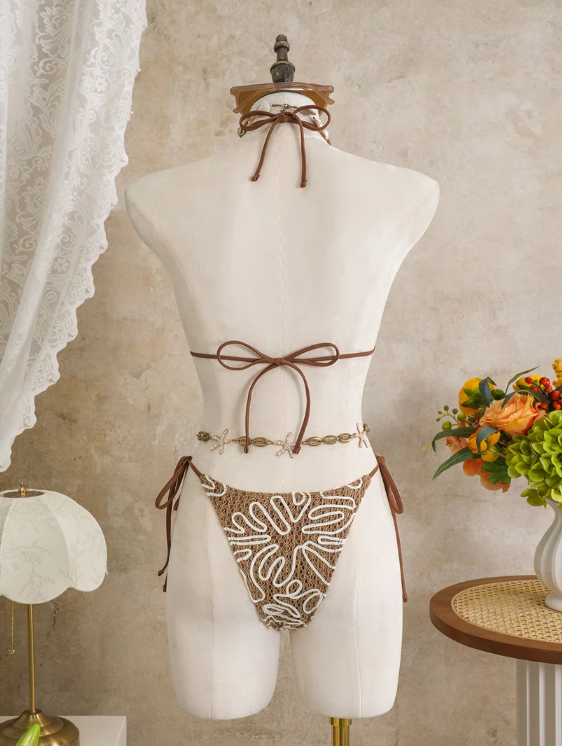 Back view of Cocoa Shell corded floral bikini set with adjustable halter tie, back tie and tie-side bottoms.