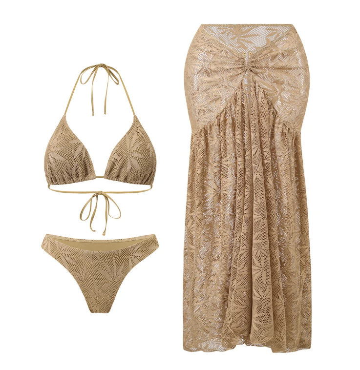 Flat lay of the Ravello Bikini & Skirt Set in taupe, including a triangle bikini top, matching bikini bottoms and a coordinating maxi skirt with gathered front detail.