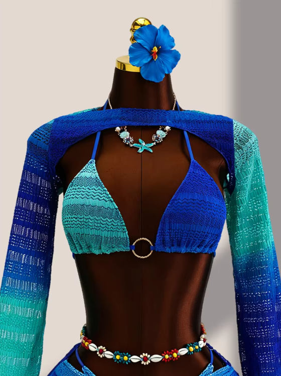 Close-up of aqua ombré crochet-look bikini top with centre ring hardware and sheer long-sleeve bolero.