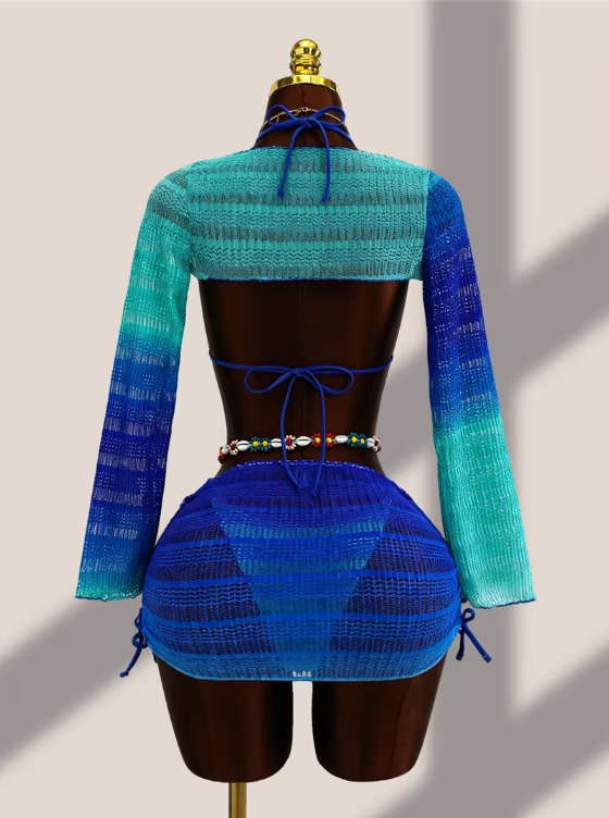 Back view of aqua ombré bikini, long-sleeve bolero and sheer mini skirt set with adjustable tie fastenings.