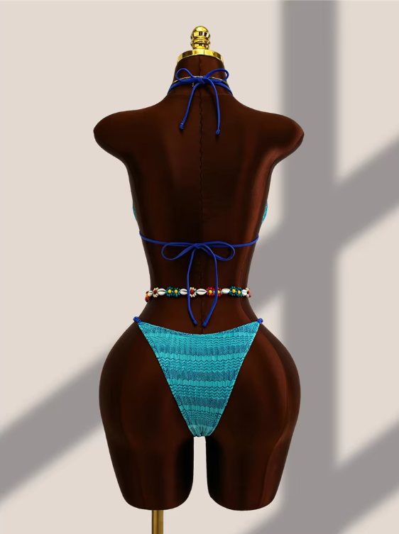 Back view of aqua crochet-look bikini set with halter neck tie, back tie and minimal high-leg bottoms.