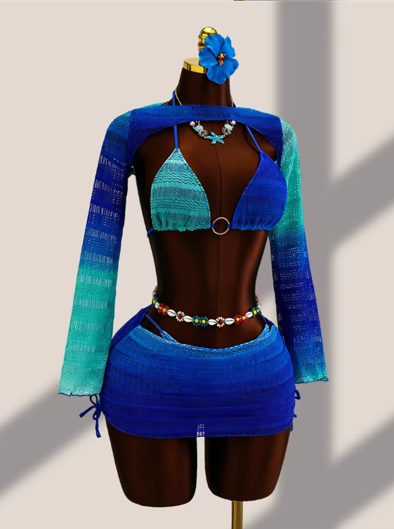 Front view of aqua ombré crochet-look bikini and sheer mini skirt set with matching long-sleeve bolero.