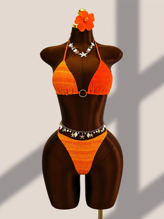 Tangerine crochet-look triangle bikini set with centre ring hardware and high-leg bottoms displayed on mannequin.