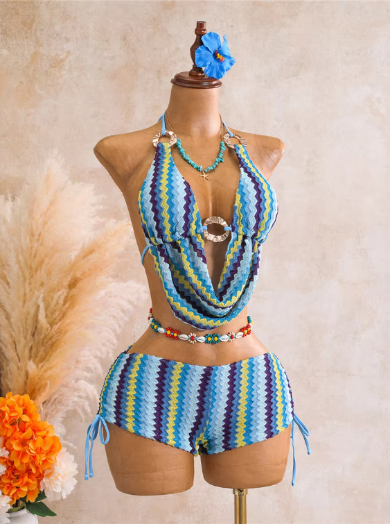 Thalassa aqua chevron halter swim set with gold-tone shell hardware and short bottoms.