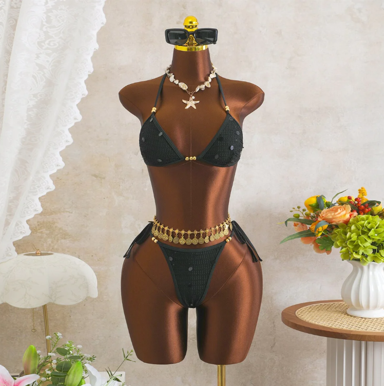 Black crochet-look triangle bikini set with sequin embellishment, gold-tone bead accents and tie-side bottoms on mannequin.