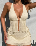 Zuri cream tankini set featuring a textured finish, open midriff detail and side-tie skirted bottom.